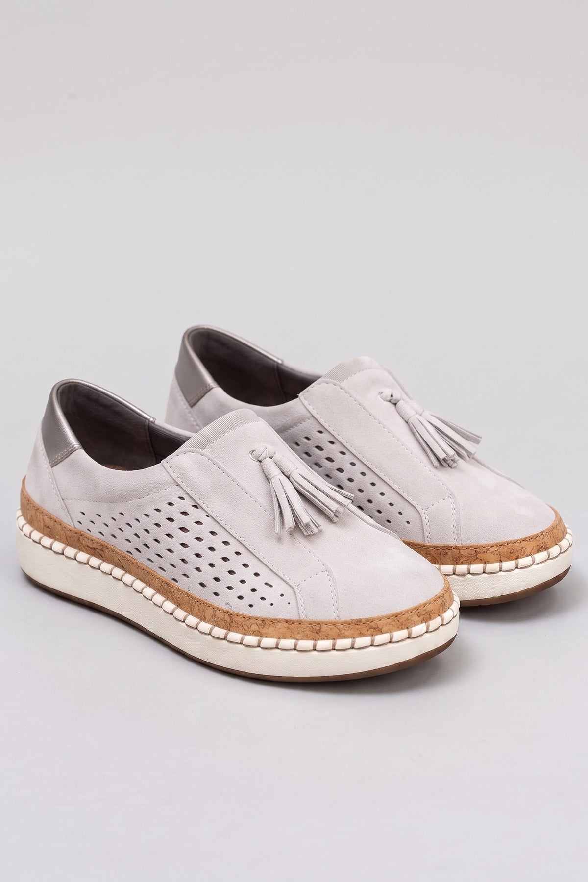 Women's Slip-On Sneaker | Tassel Detail — White — shoe_main — on model