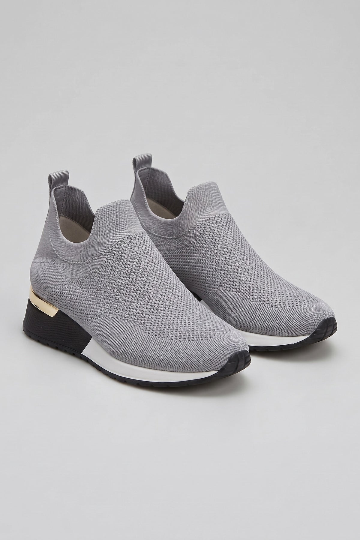 Women's Slip-On Sneakers | Metallic Heel — Light Grey — shoe_main — on model