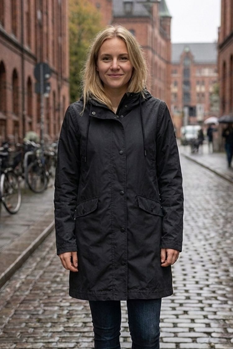 Women's hooded raincoat with drawstring hood and flap pockets – 18