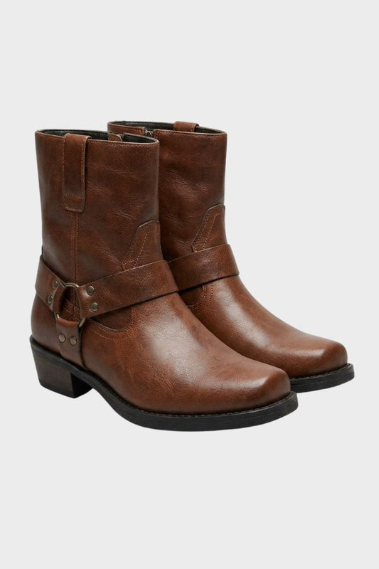 Men's harness boots with side zip, stud ankle strap, and block heel