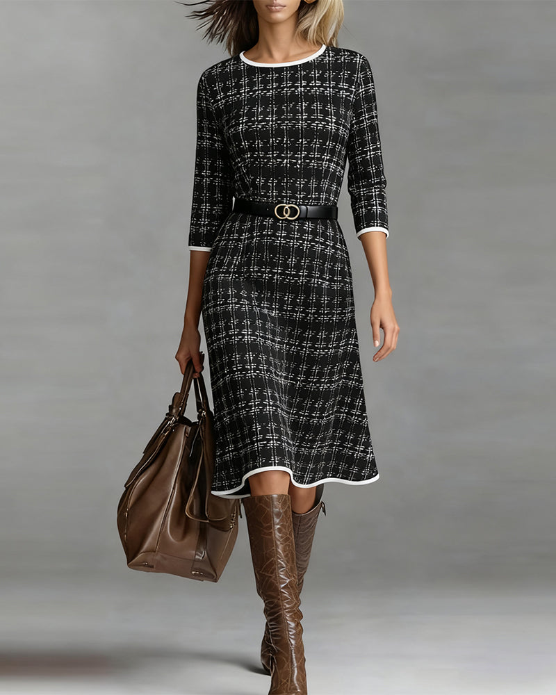 Women's midi dress with round crew neckline, three-quarter sleeves, and plaid pattern