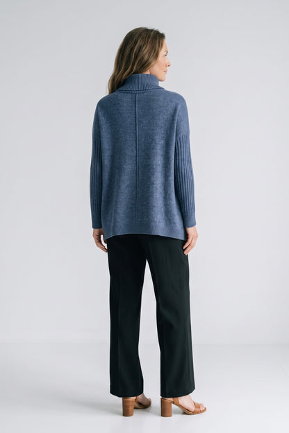 Women's Turtleneck Sweater | High-Low Hem — Blue — back view — on model
