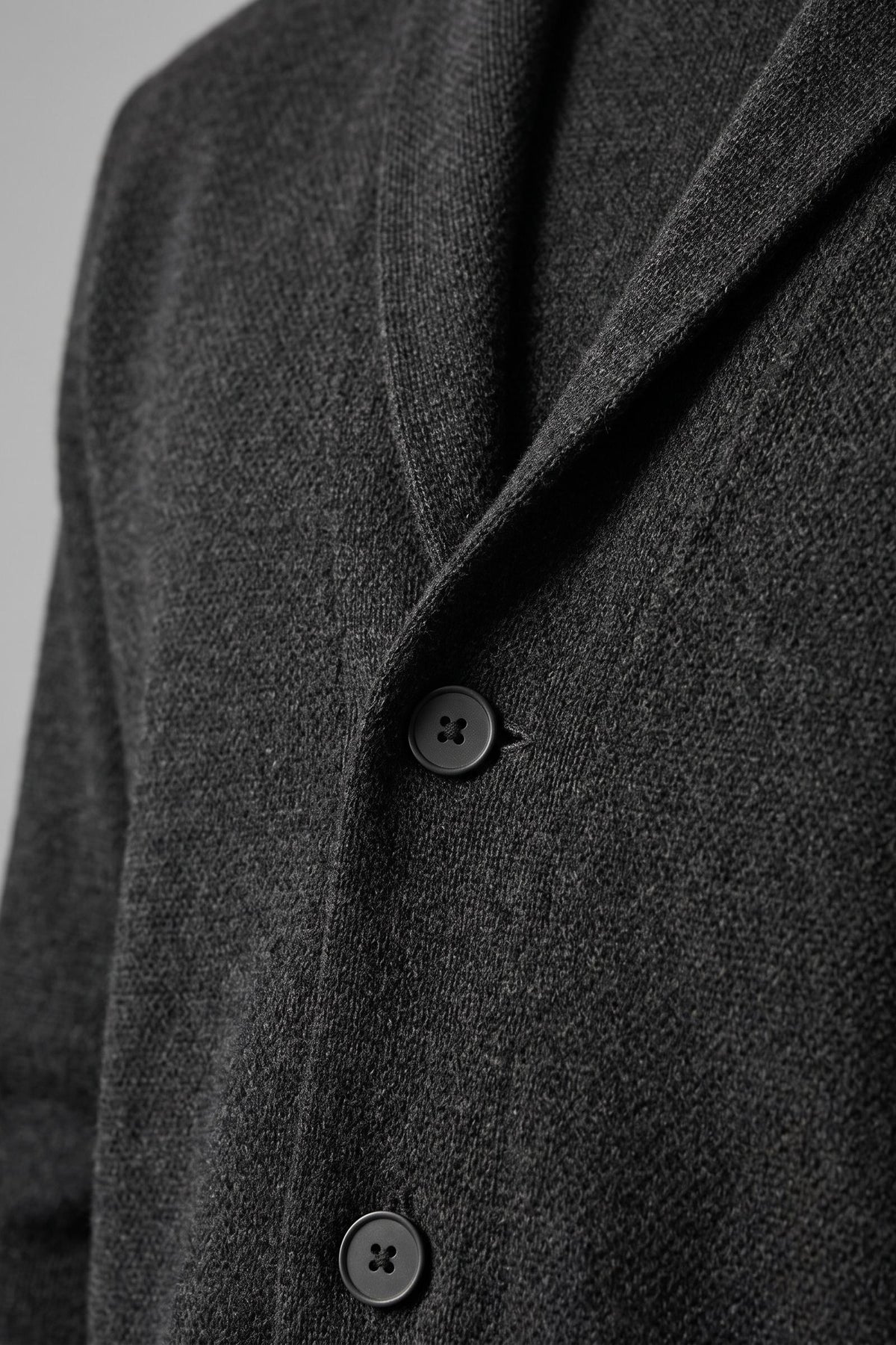 Men's Shawl-Collar Cardigan | Two-Button — Black — detail — on model