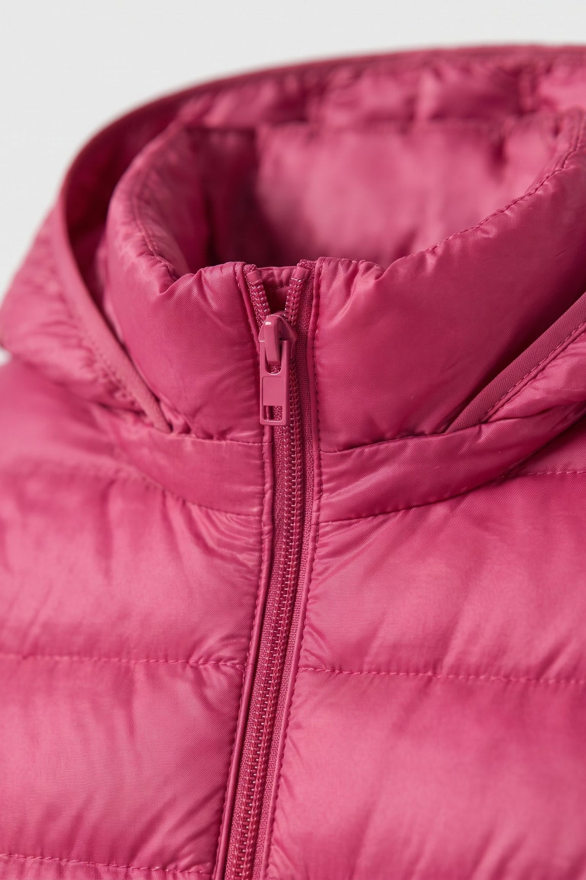 Women's Long Puffer Jacket | Hooded — Dark Pink — detail — on model