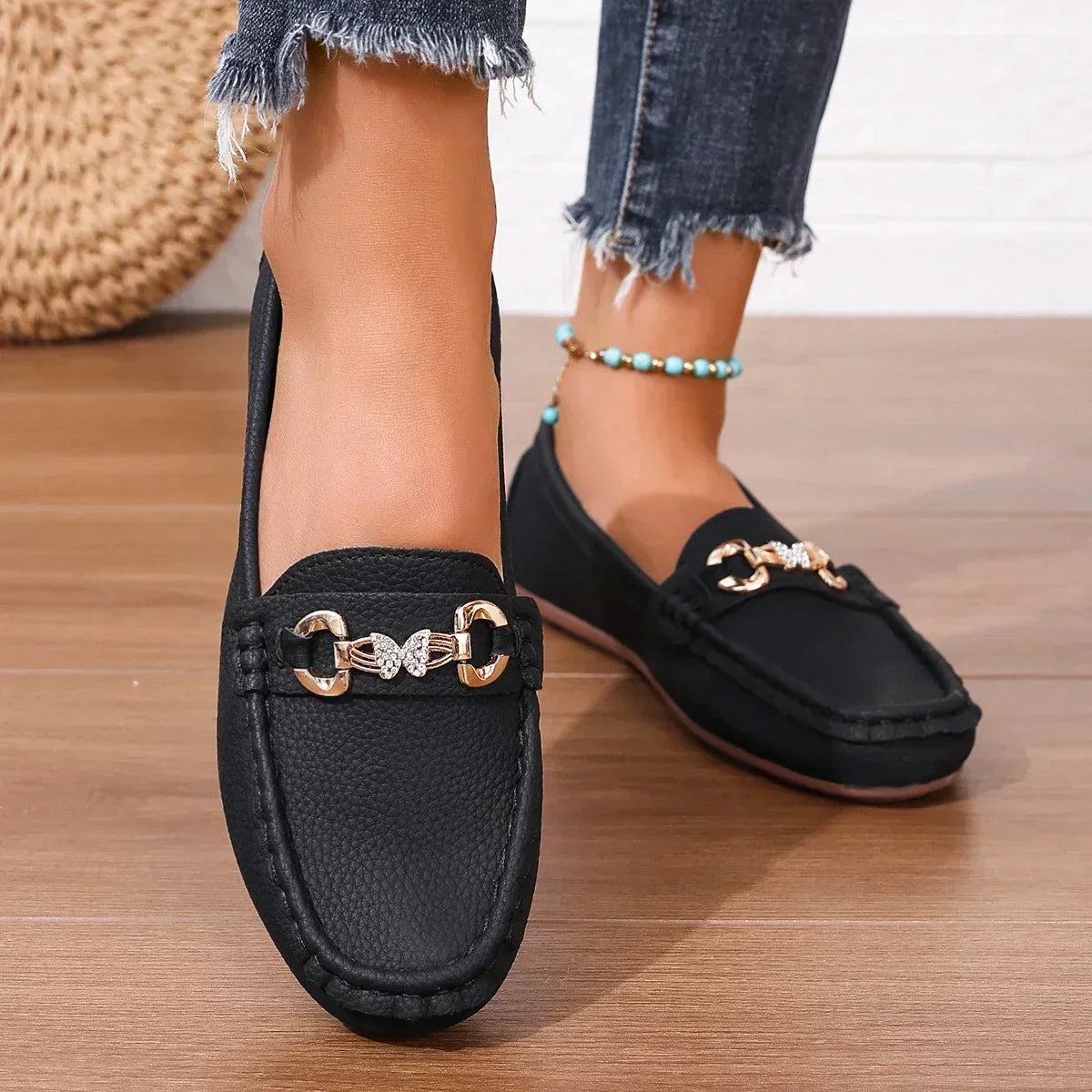 Women's slip-on loafers with round toe and butterfly buckle detail – 3