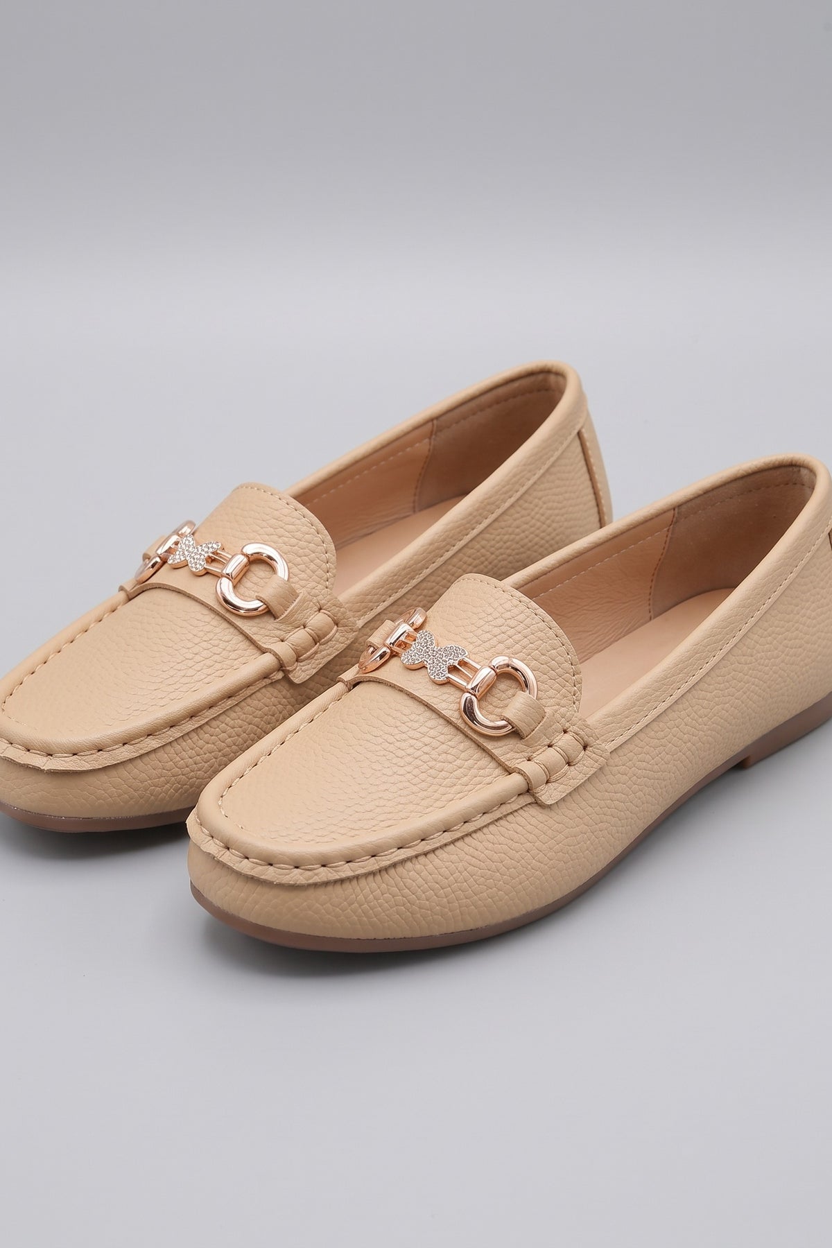 Women's Slip-On Loafers | Butterfly Buckle — Beige — shoe_main — on model