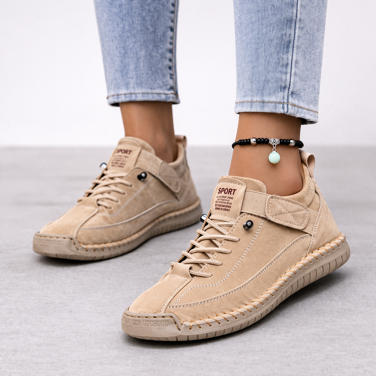 Women's low-top sneaker with lace-up closure and hook-and-loop strap
