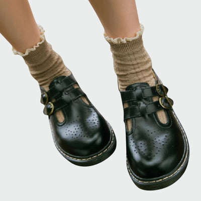 Women's Mary Jane shoes with perforated toe and platform sole