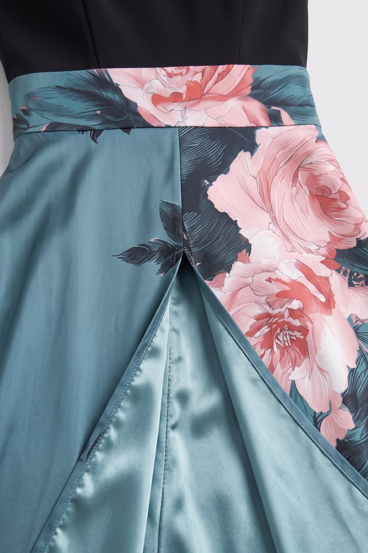 Women's Fall Wedding Guest Dress | Floral Halter A-Line Maxi — Black/Teal Floral — detail — on model
