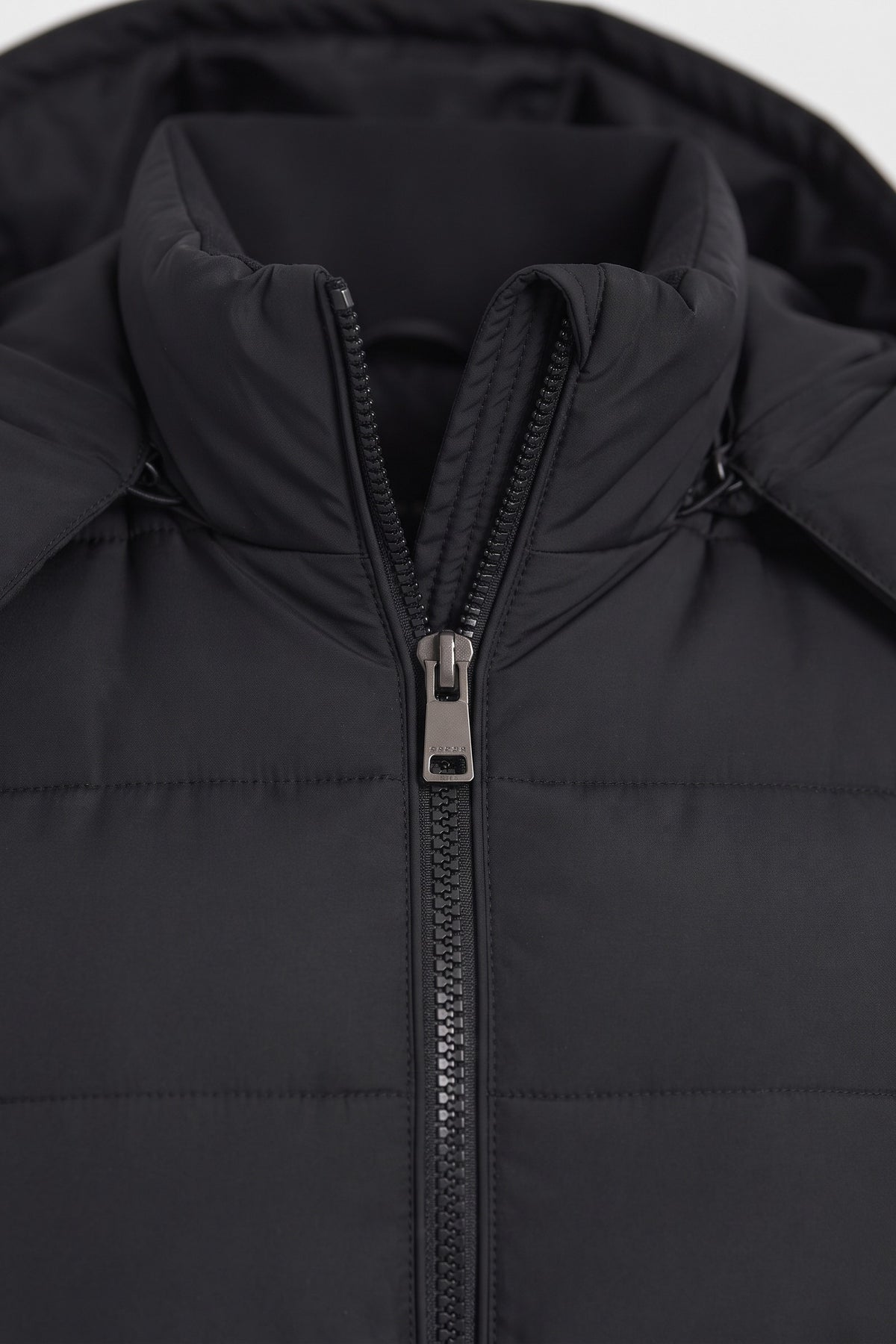 Women's Longline Puffer Coat | Hooded — Black — detail — on model