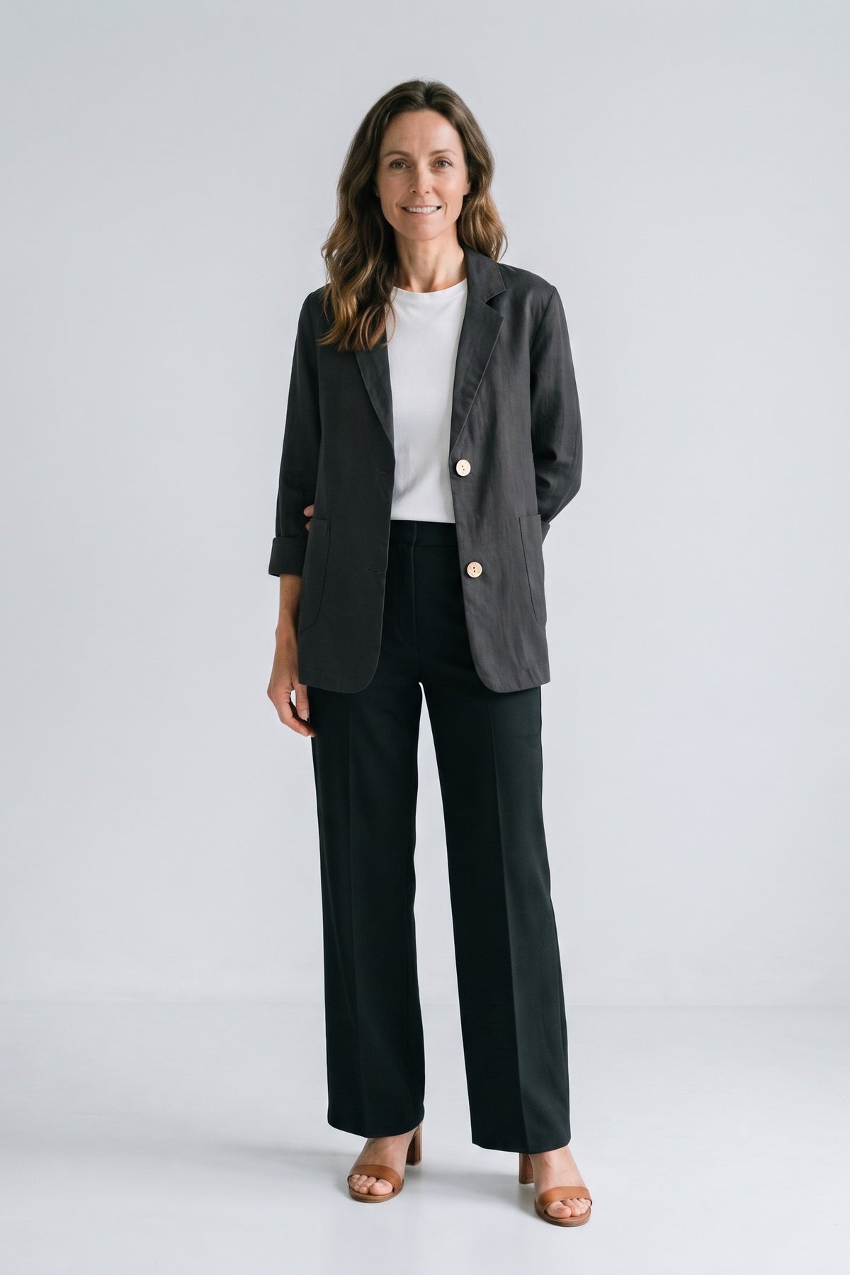 Women's Notched Lapel Blazer | Curved Hem — Black — front view — on model