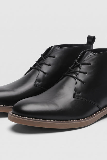 Men's Lace-Up Desert Boots | Round Toe — Black — shoe_detail — on model