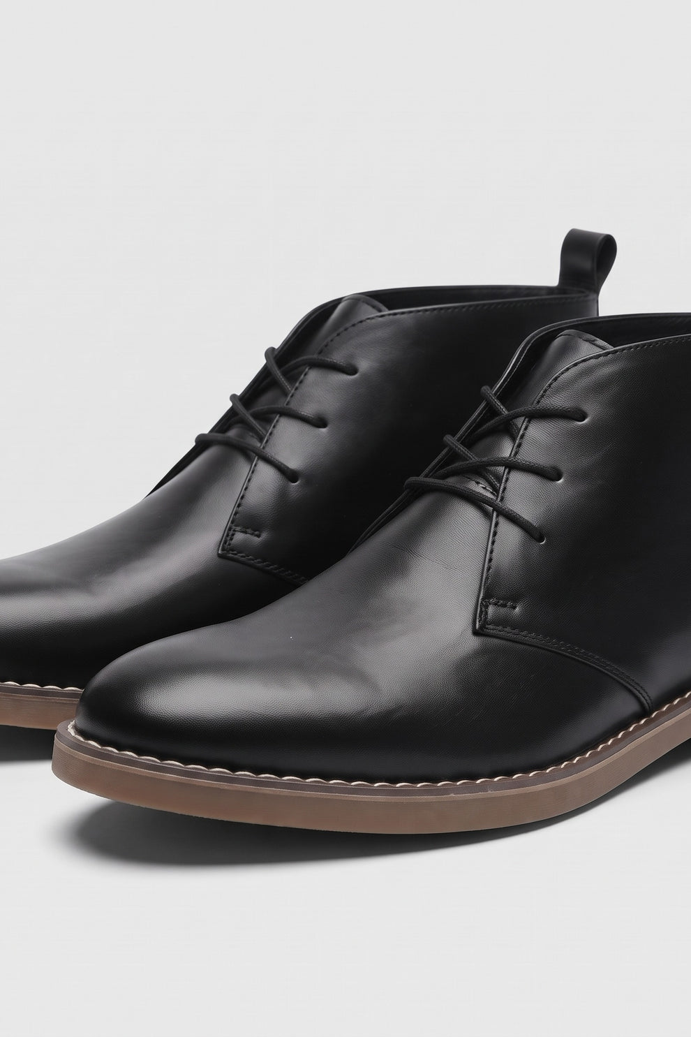 Men's Lace-Up Desert Boots | Round Toe — Black — shoe_detail — on model