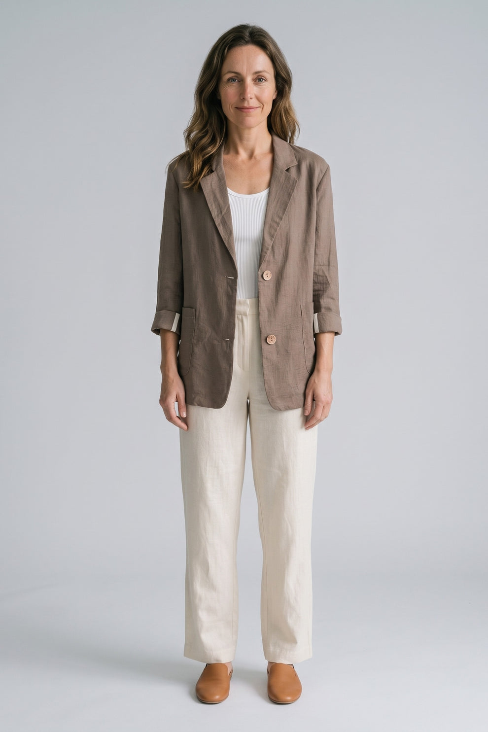 Women's Notched Lapel Blazer | Curved Hem — Camel — front view — on model