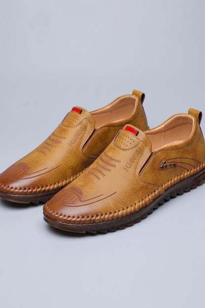 Men's Slip-On Loafers | Moc-Toe Stitching — Intense Orange — shoe_main — on model