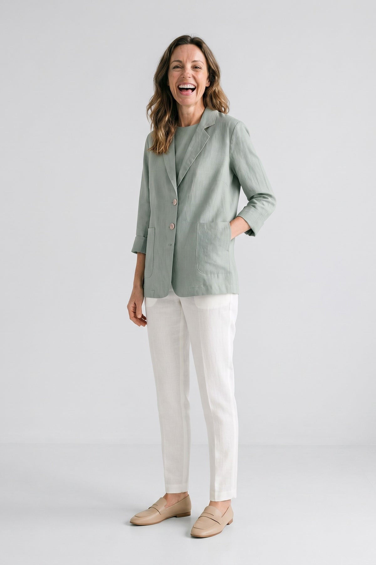 Women's Notched Lapel Blazer | Curved Hem — Light Green — front view — on model