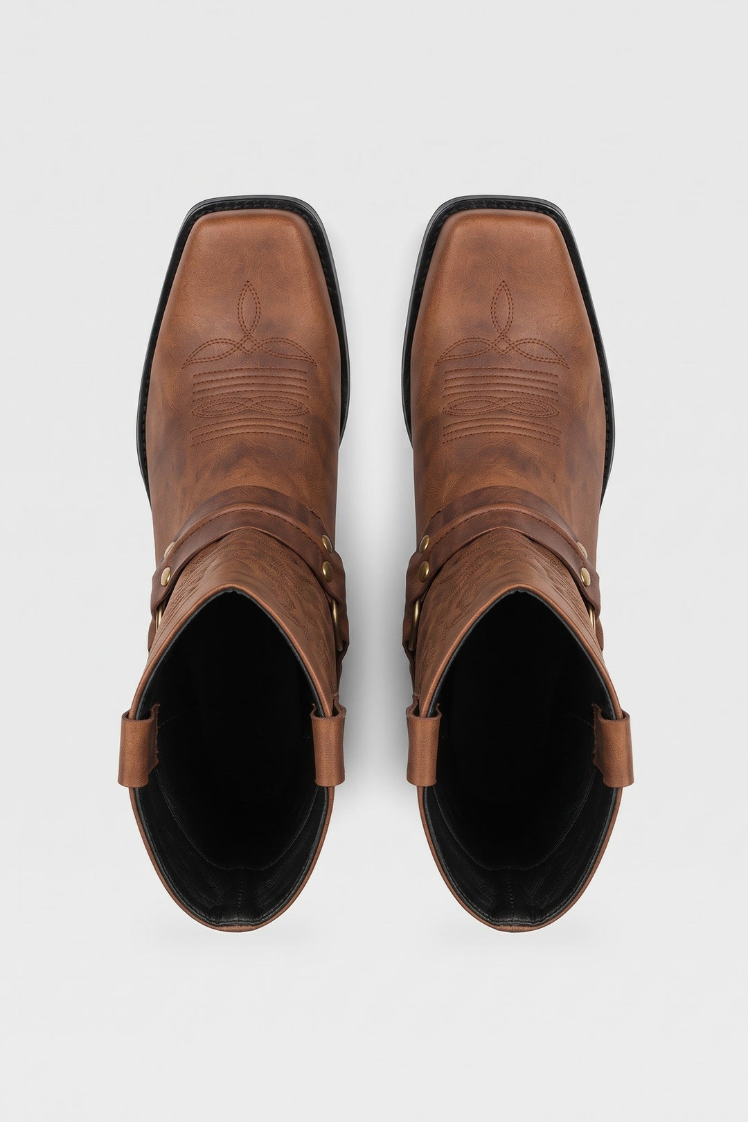 Men's brown harness boots seen from above, square toe