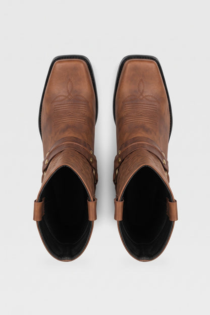 Men's brown harness boots seen from above, square toe