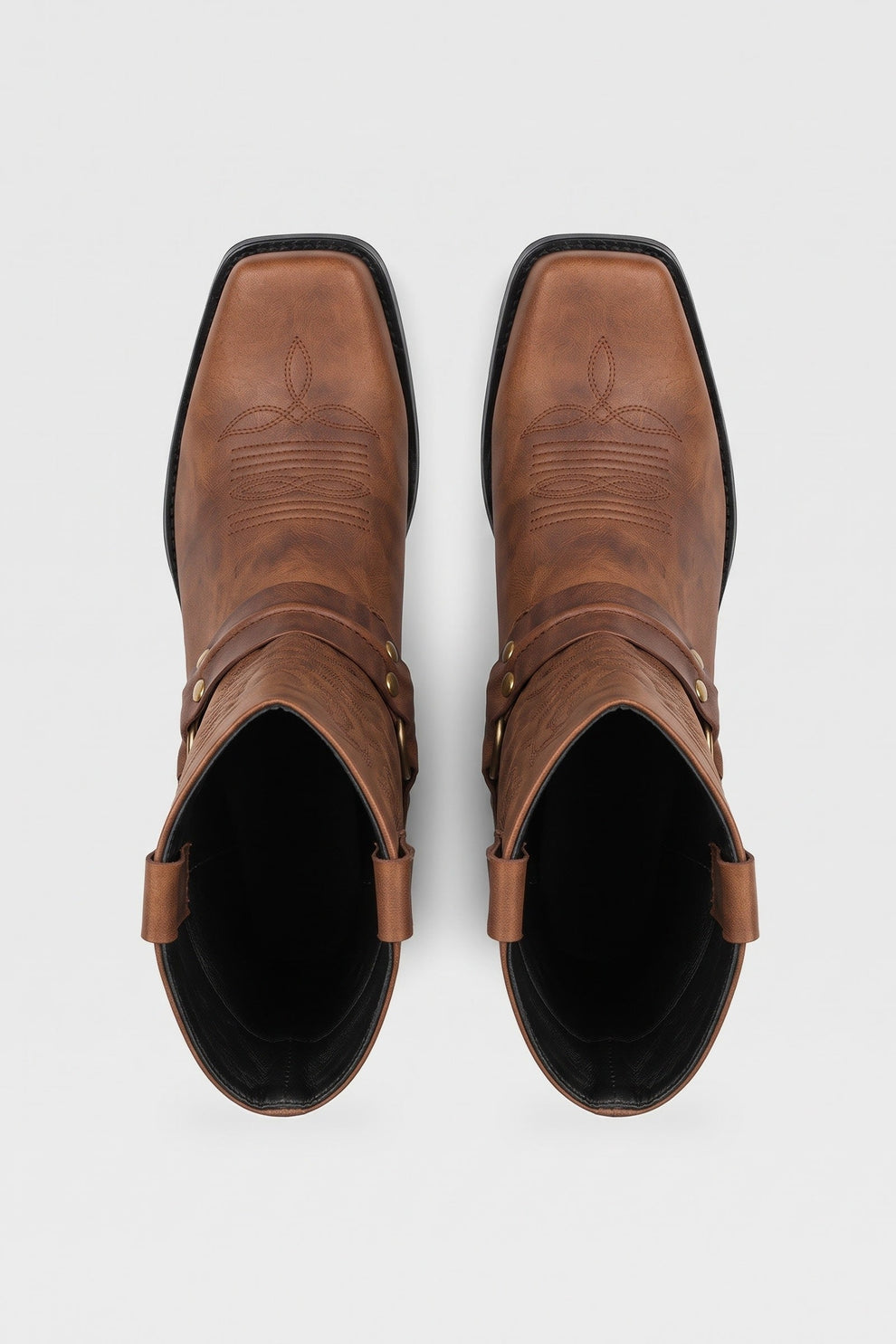 Men's brown harness boots seen from above, square toe