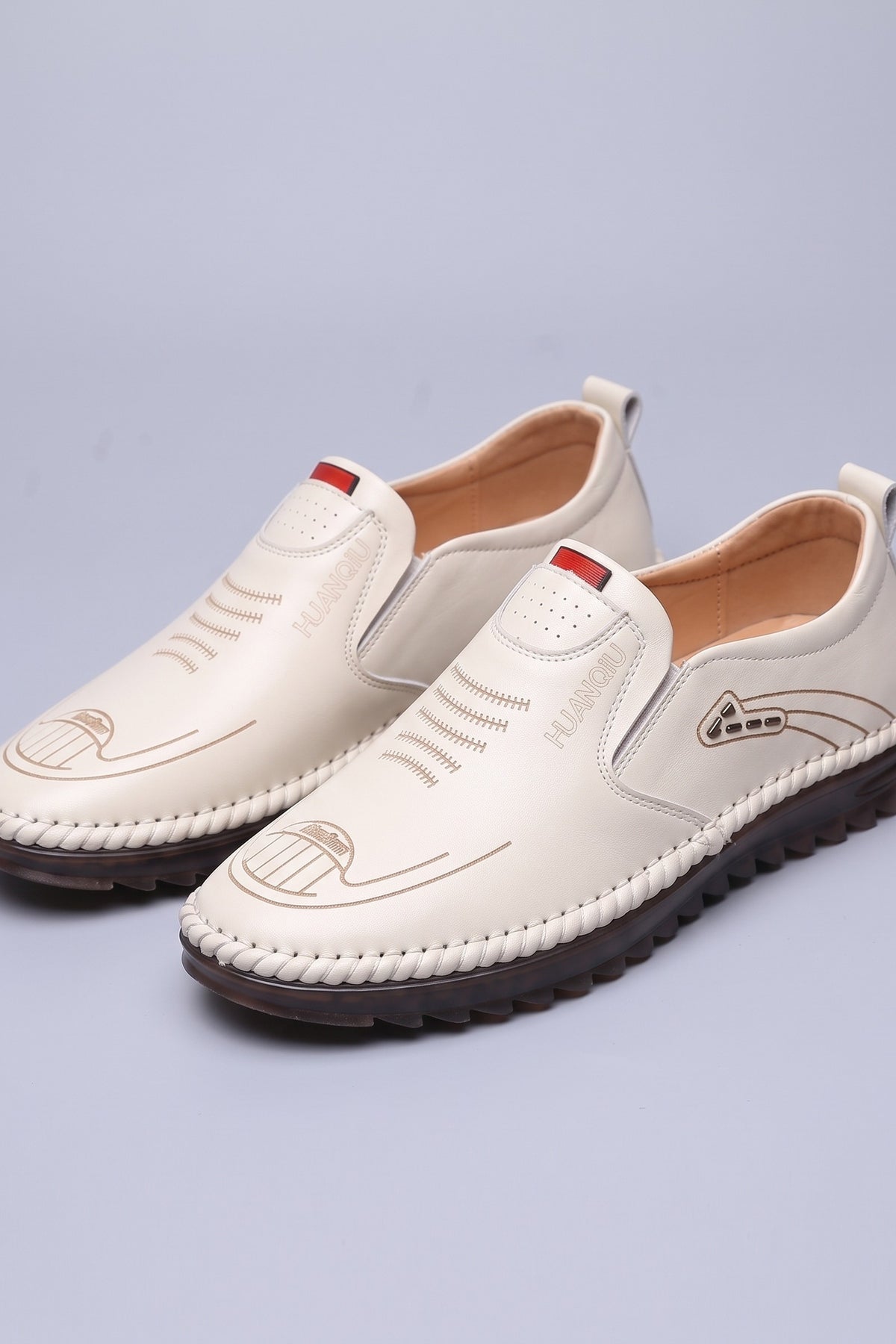 Men's Slip-On Loafers | Moc-Toe Stitching — White — shoe_main — on model