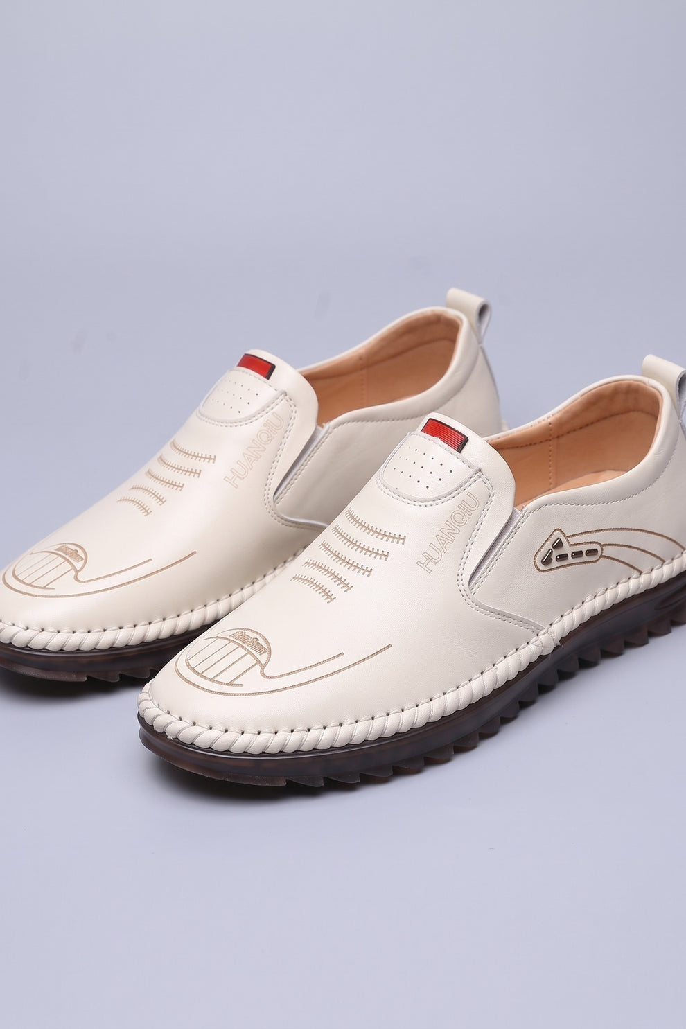 Men's Slip-On Loafers | Moc-Toe Stitching — White — shoe_main — on model
