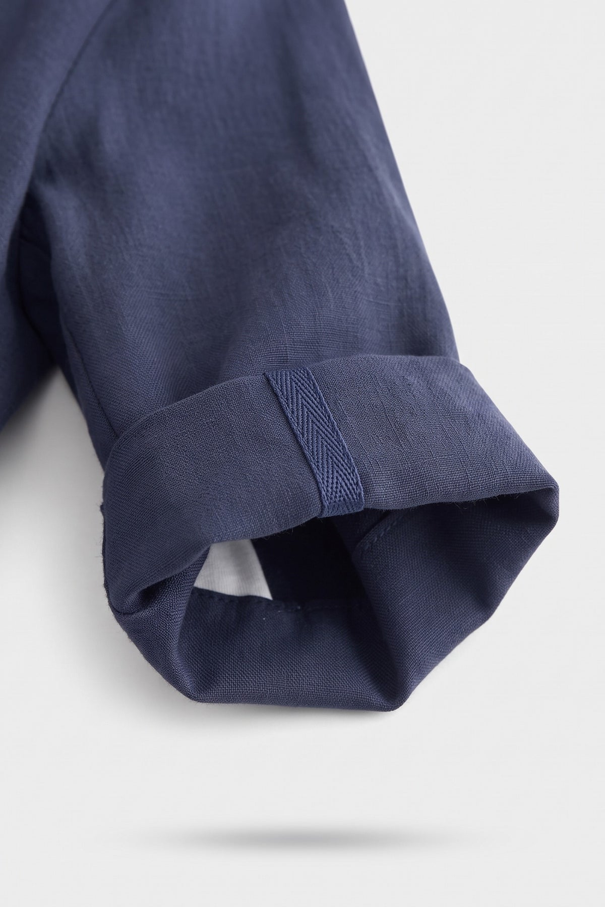 Women's Notched Lapel Blazer | Curved Hem — Navy — detail — on model