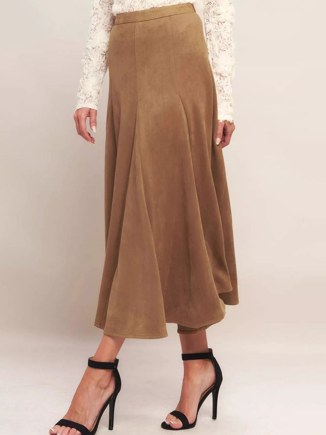 Side view of the camel A line skirt showing the panelled flare