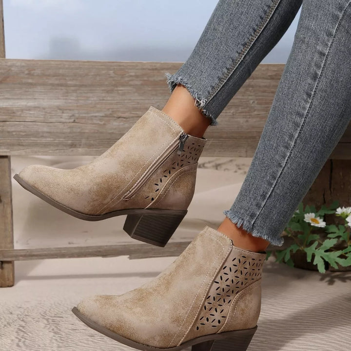 Taupe block heel ankle boots worn with raw hem jeans