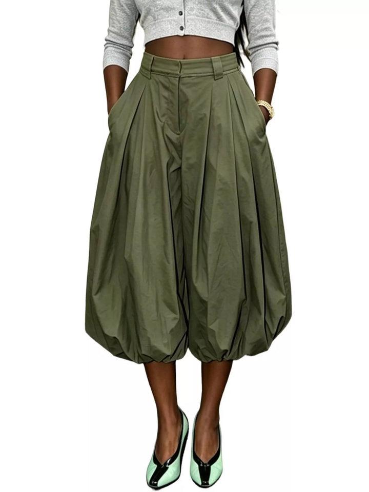 Army green balloon pants shown full length with pockets and gathered hems