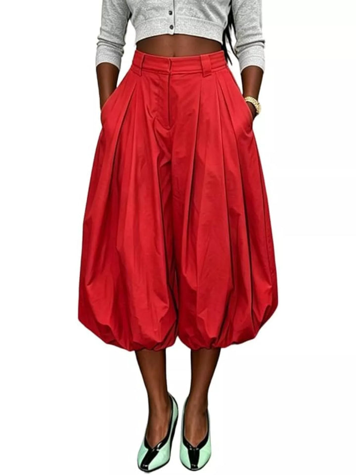Red balloon pants with a high waist and rounded bubble hem