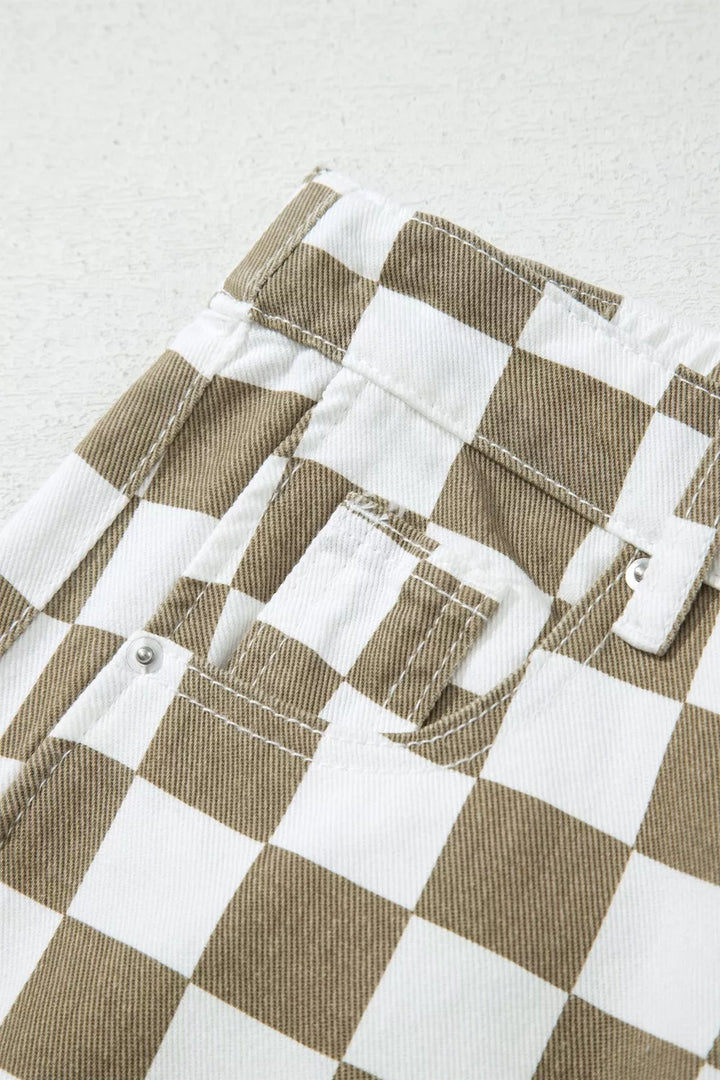 Detail of the front pocket and stitching on the checkerboard pants