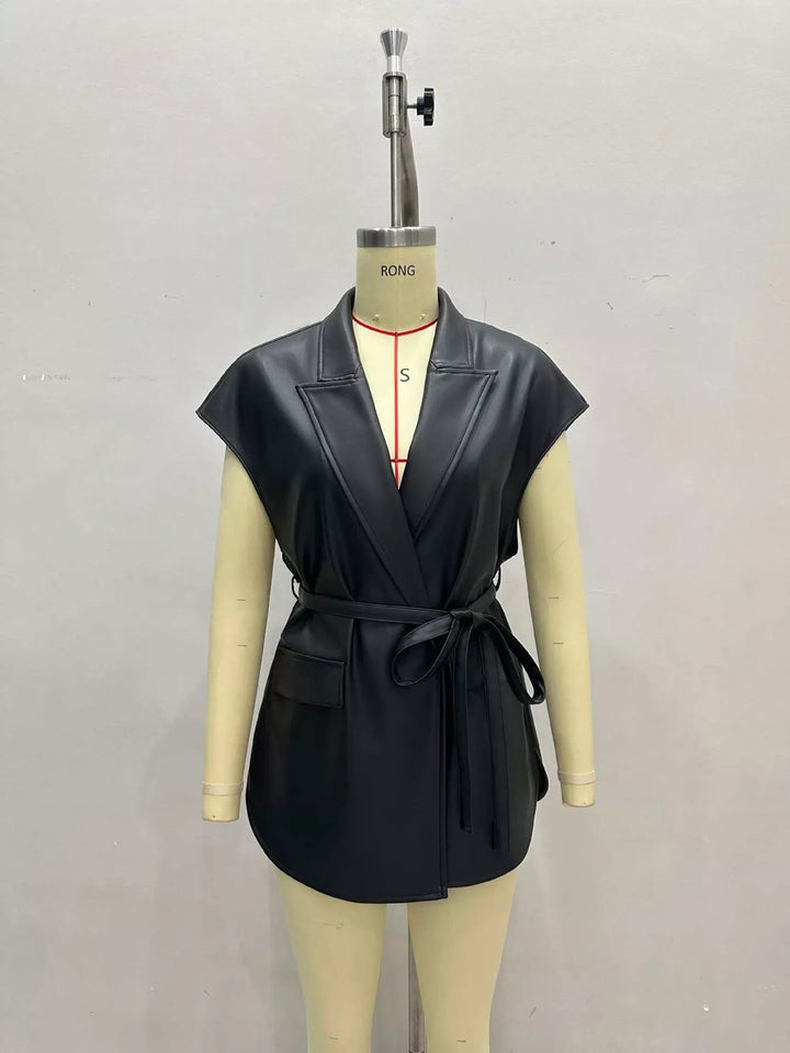 Black belted vest with notch lapel shown on a mannequin