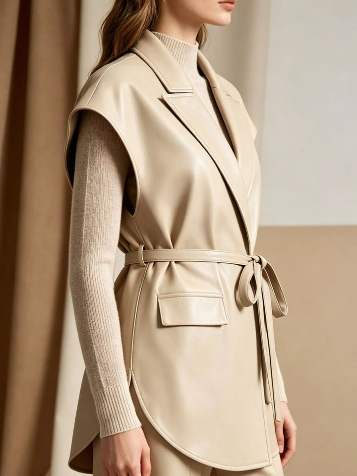 Side view of the camel sleeveless vest with flap pocket and belt