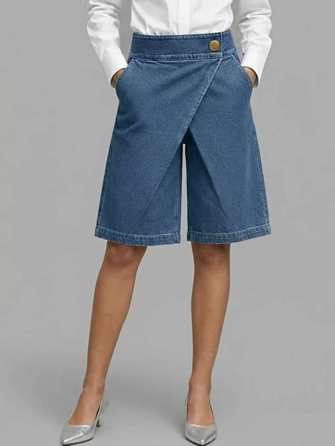 Women's Bermuda shorts in dusty blue with high waisted knee length wrap front, front view