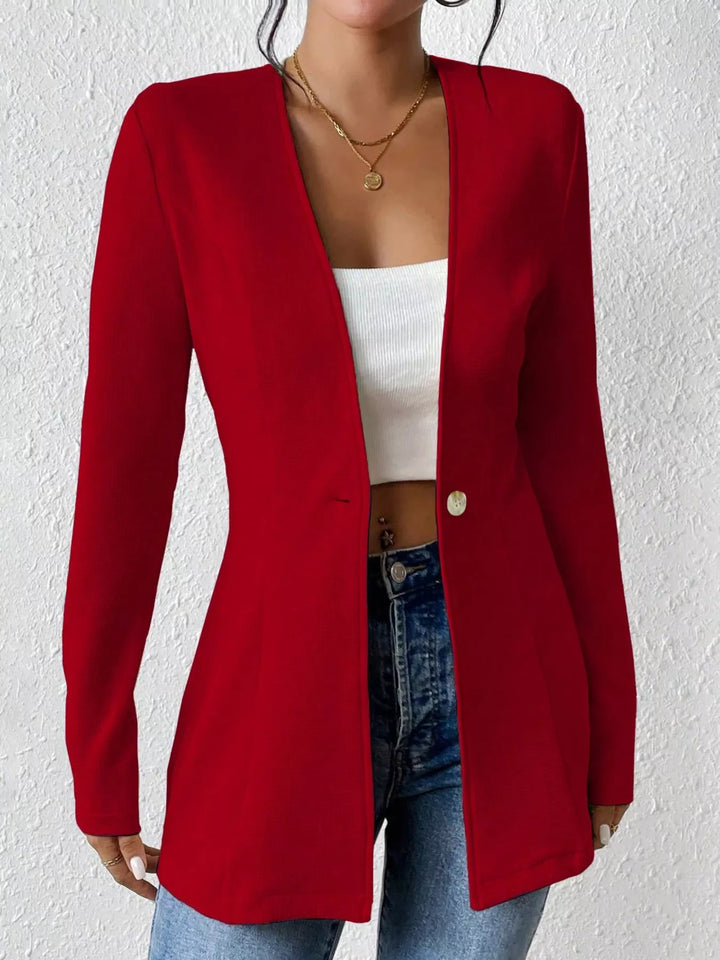 Red collarless V neck blazer, front view over a white top