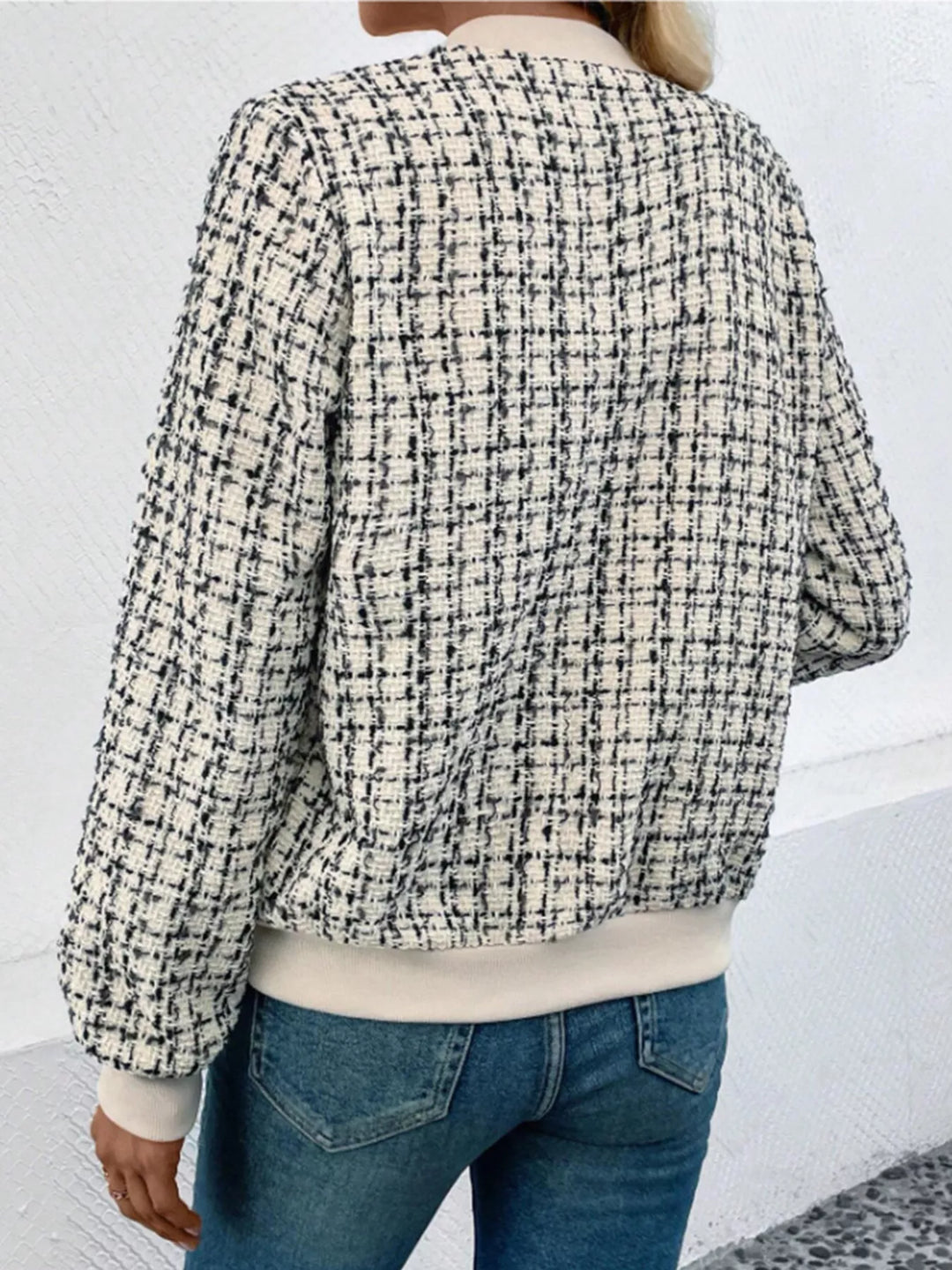 Back view of the cream plaid tweed look cropped bomber jacket