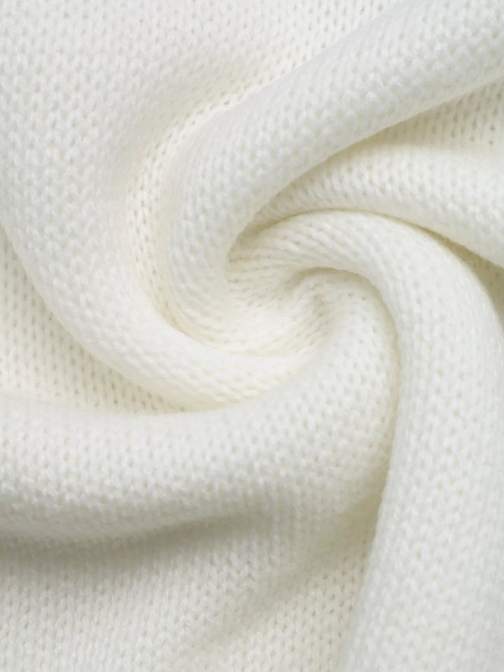 Close-up of the soft white knit texture, swirled fabric