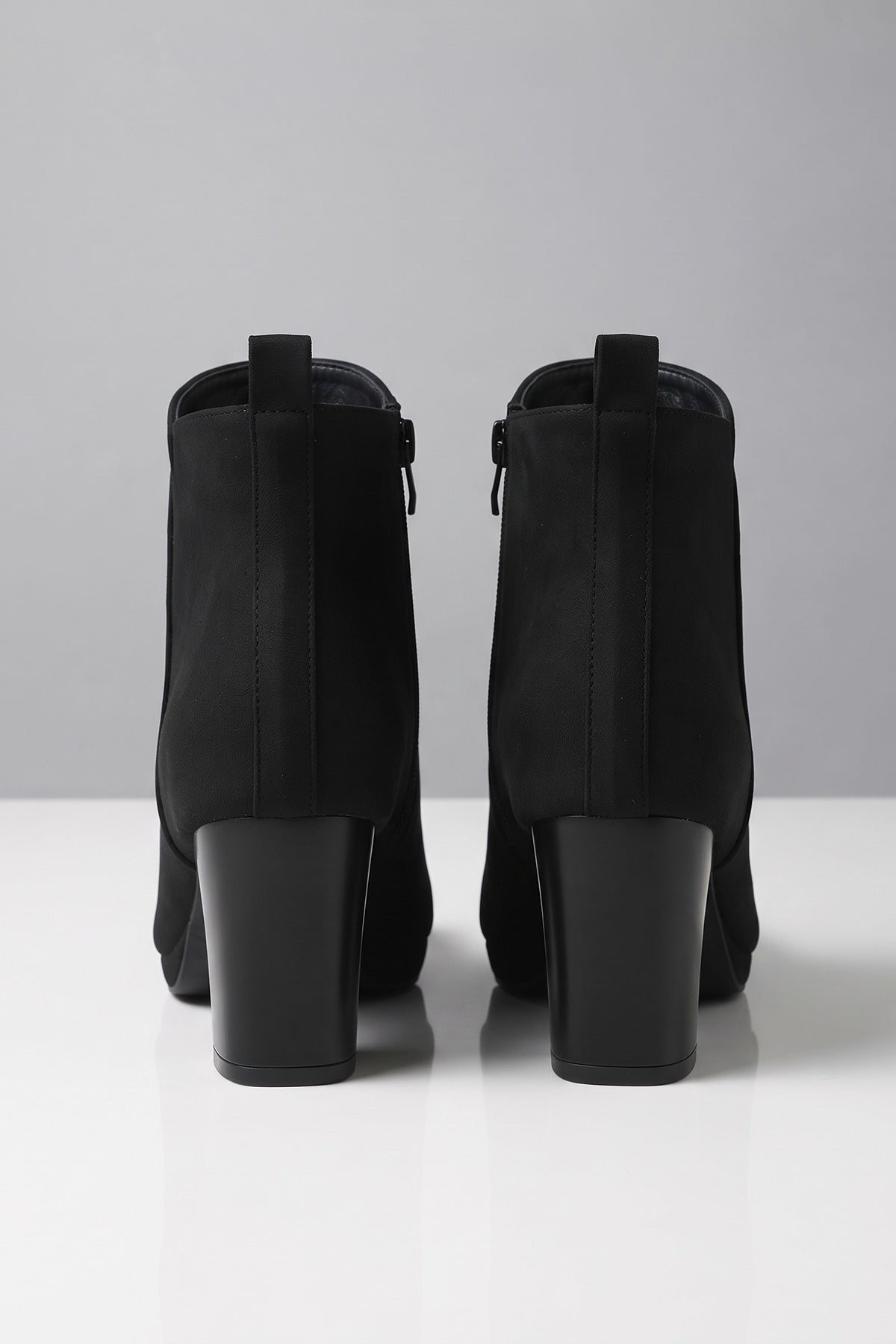 Women's Buckle Ankle Boots | Block Heel — Black — shoe_back — on model