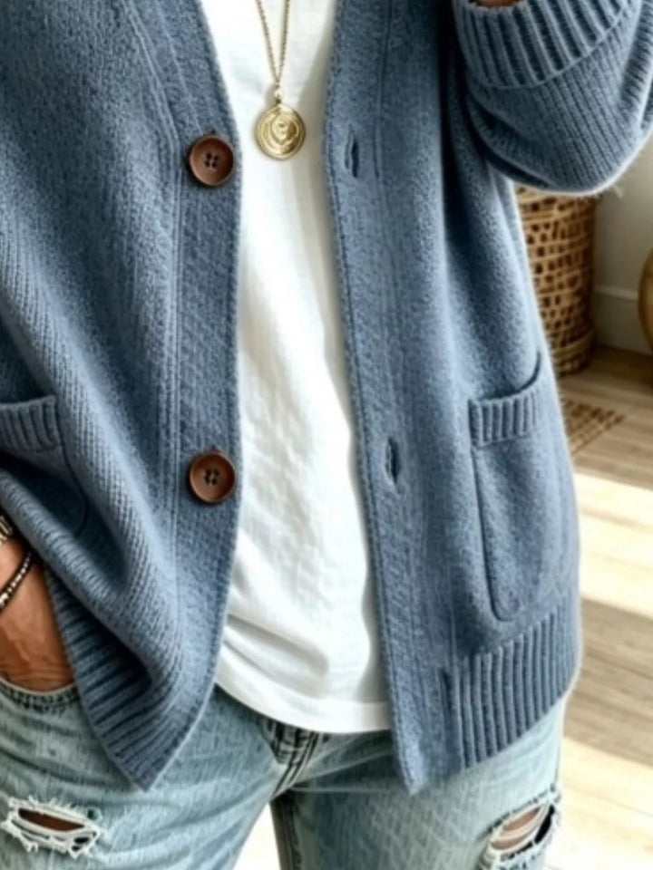 Detail of the dusty blue cardigan patch pockets and button front