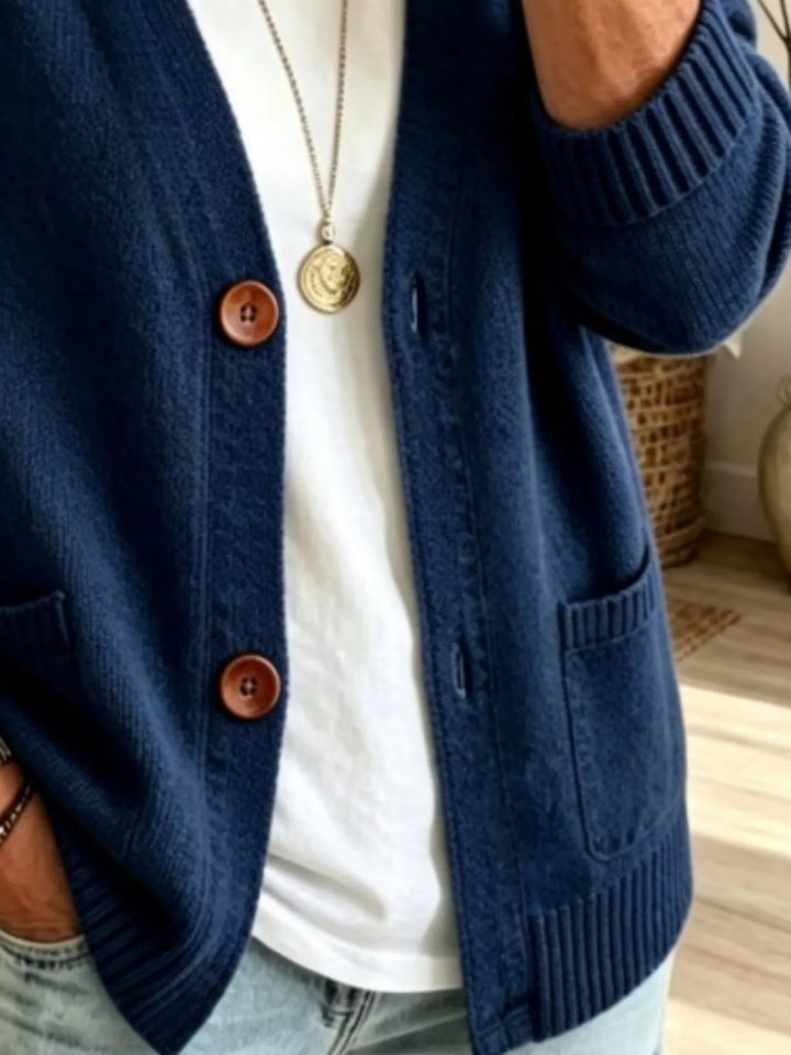 Detail of the navy cardigan patch pockets and button front
