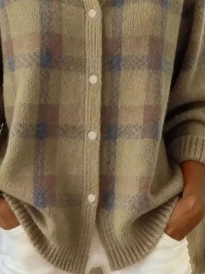 Detail of the khaki plaid cardigan placket and ribbed hem