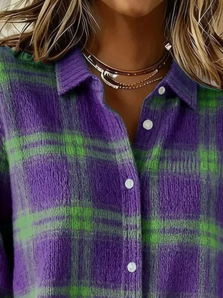 Close-up of the purple plaid cardigan collar and green check