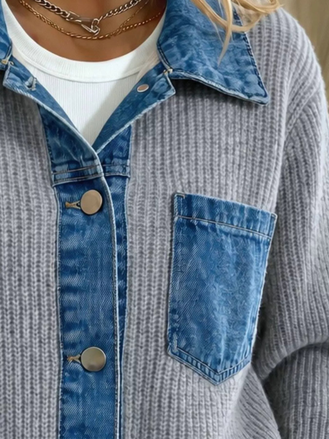 Detail of the gray cardigan denim placket and pocket