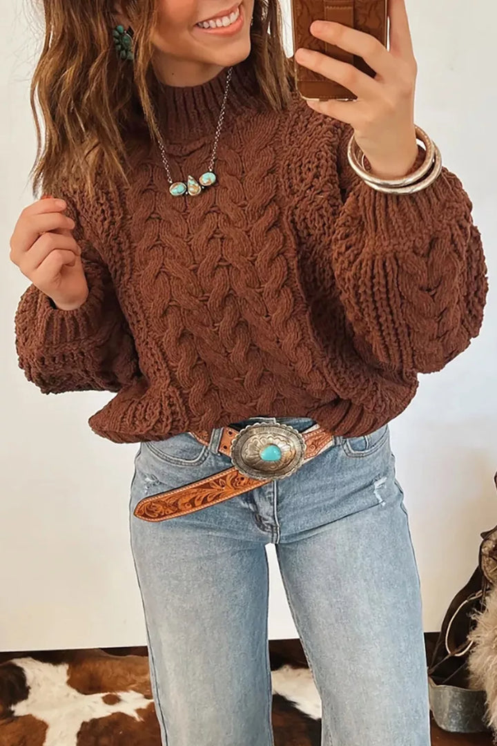 Women's cable knit sweater in chestnut with mock neck and bubble sleeves, mirror selfie with jeans