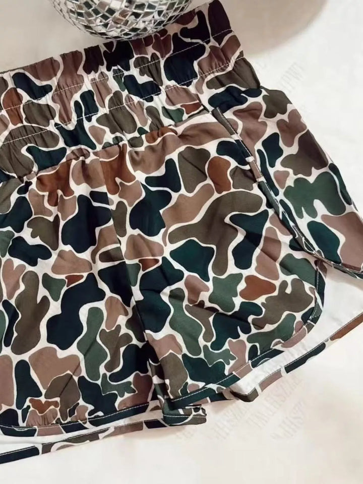 Woodland camo shorts close-up of the elastic waistband and white inner lining