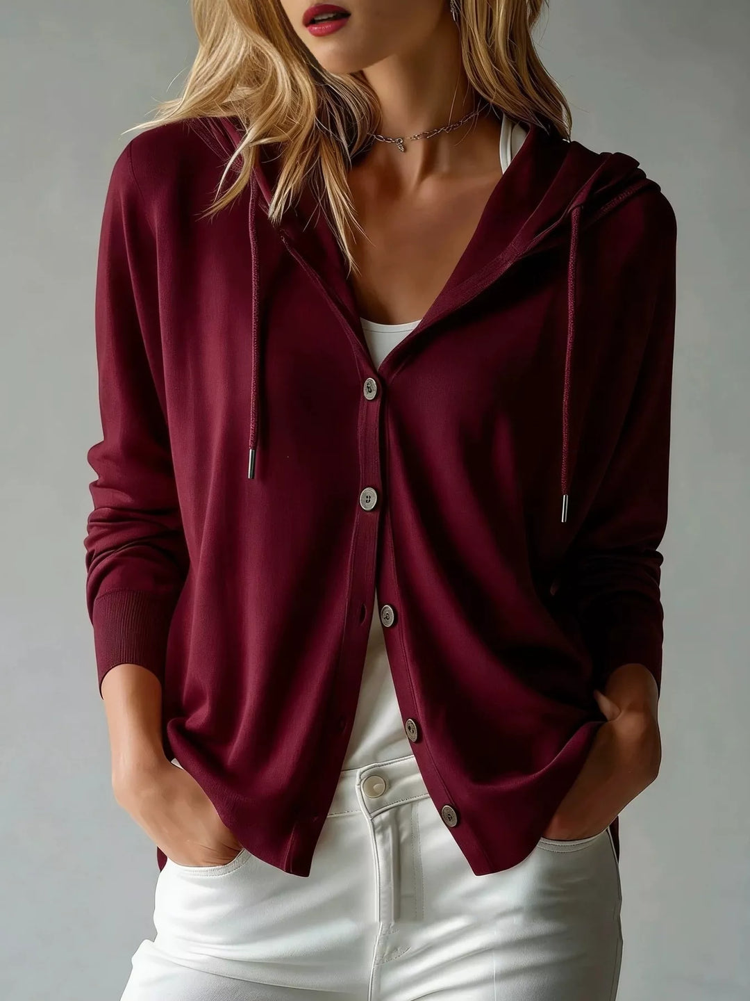 Burgundy hooded cardigan with buttons and drawstring hood, front view