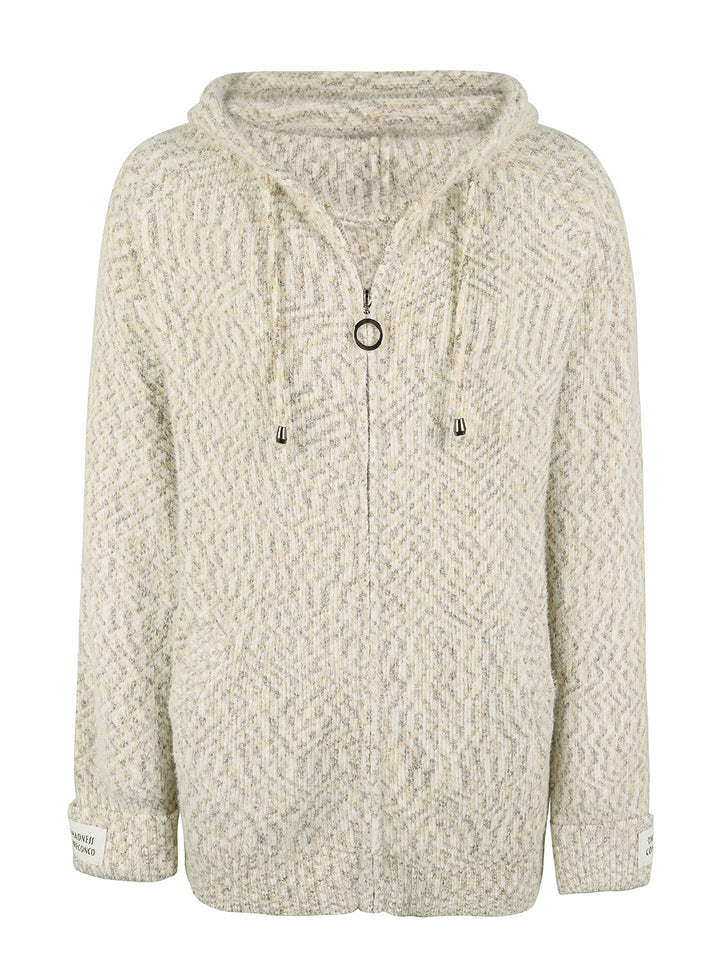 Beige zip front hooded cardigan laid flat with ring zipper pull