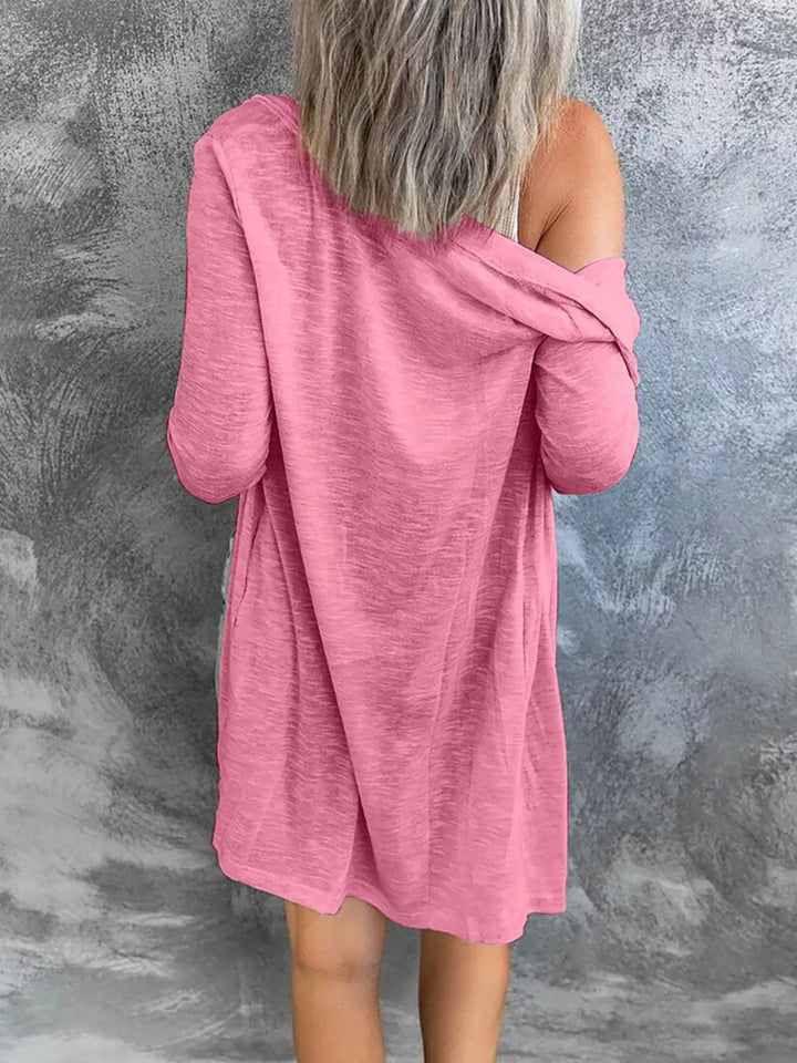 Back view of pink lightweight cardigan with relaxed drape