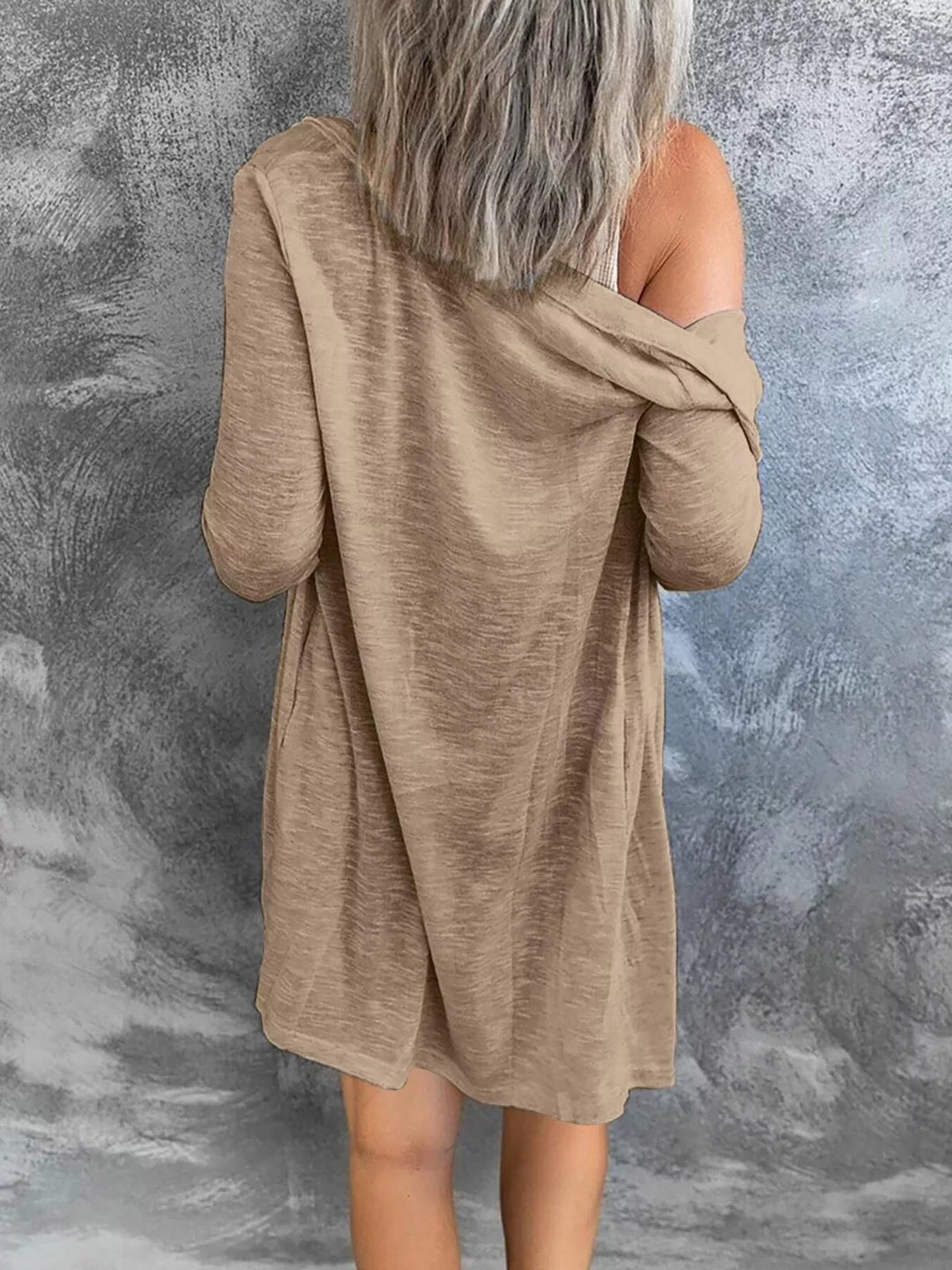 Tan lightweight cardigan from behind, loose longline fit