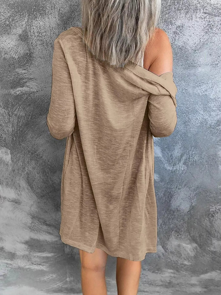 Tan lightweight cardigan from behind, loose longline fit